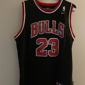 Brand new Michael Jordan all stitched Black Jersey with red stickers name number